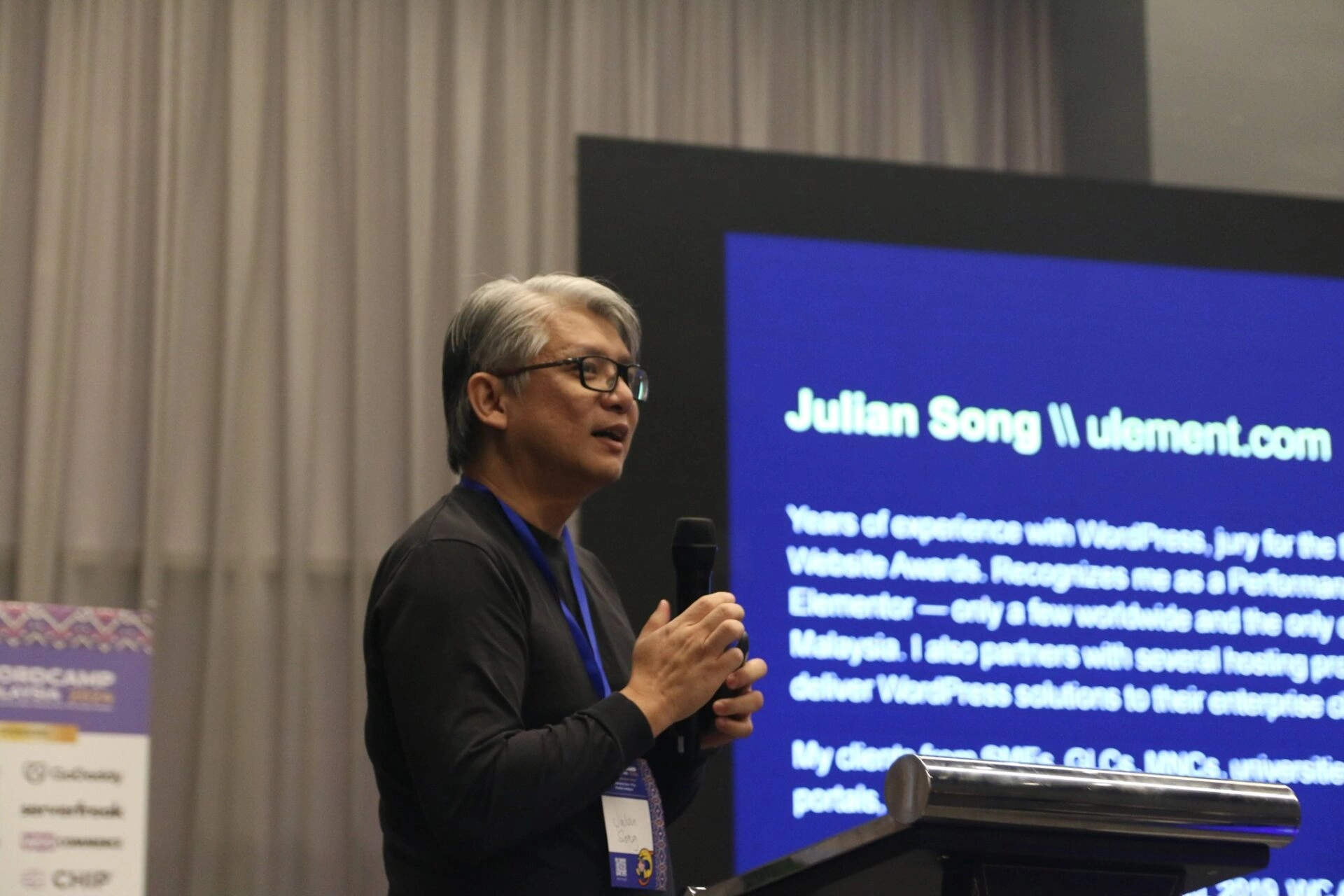 Julian Song speaking at WordCamp Malaysia